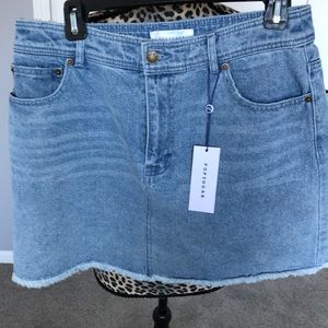 Light blue denim mini skirt